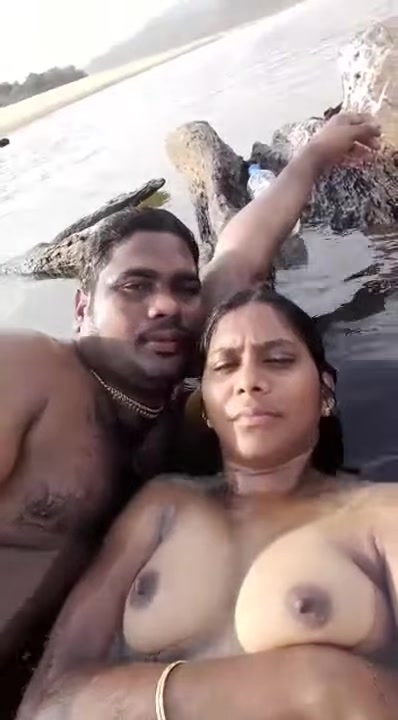 Mature Indian Couple Outdoor Enjoying In River